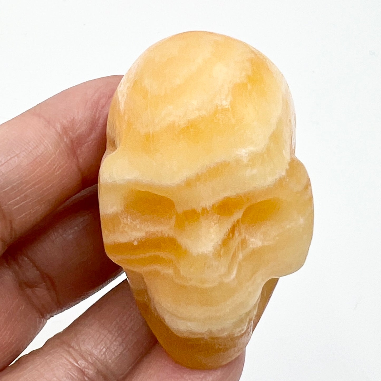 Banded Orange Calcite Skull 2 Inches Hand Carved Crystal Carving