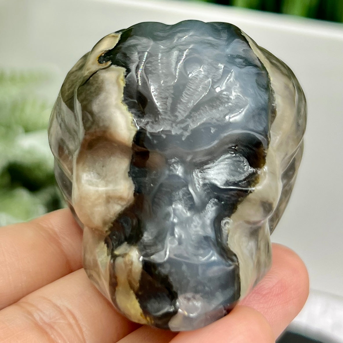 Volcanic Agate Halloween Skull in Pumpkin UV Reactive Crystal Carving 136g