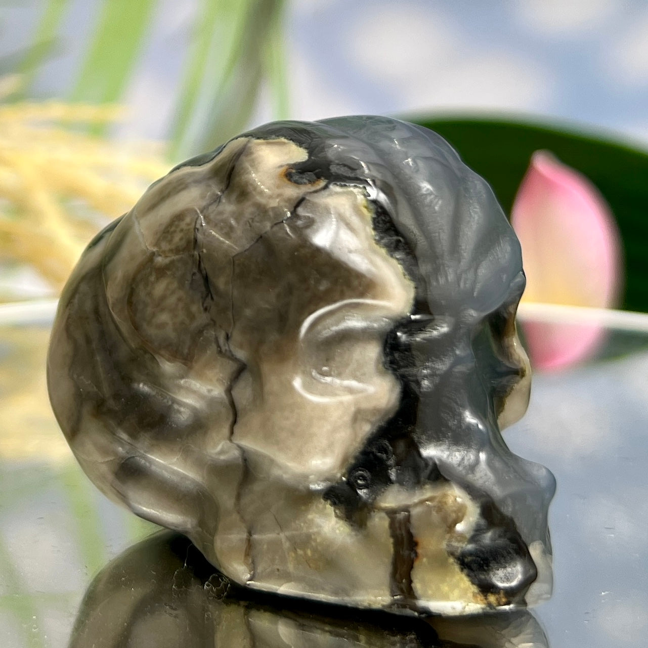 Volcanic Agate Halloween Skull in Pumpkin UV Reactive Crystal Carving 136g