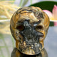 Volcanic Agate Halloween Skull in Pumpkin UV Reactive Crystal Carving 118g