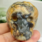 Volcanic Agate Halloween Skull in Pumpkin UV Reactive Crystal Carving 118g