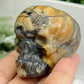 Volcanic Agate Halloween Skull in Pumpkin UV Reactive Crystal Carving 118g