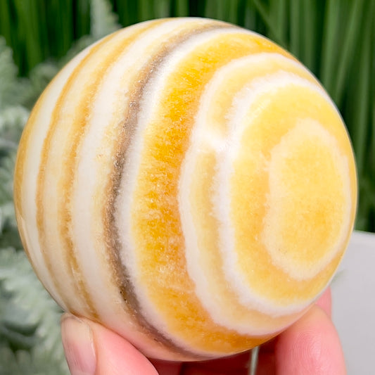 Banded Orange Calcite Sphere Healing Crystal Ball 528g 73mm