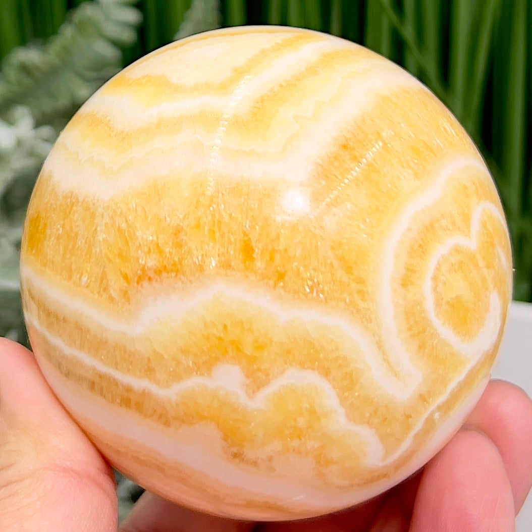 Banded Orange Calcite Sphere Healing Crystal Ball 488g 71mm