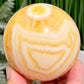 Banded Orange Calcite Sphere Healing Crystal Ball 488g 71mm