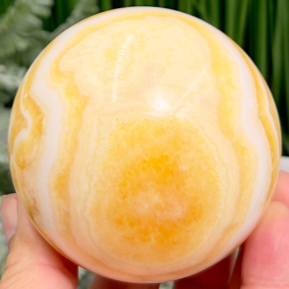 Banded Orange Calcite Sphere Healing Crystal Ball 488g 71mm