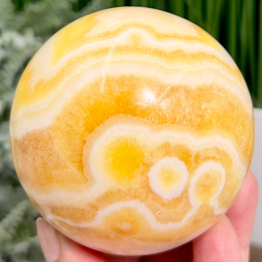 Banded Orange Calcite Sphere Healing Crystal Ball 540g 73mm