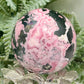 Peruvian Rhodonite Sphere Compassion Emotional Balance Crystal Ball 462g 63mm