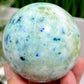 Fynchenite Phoenix Stone with Pyrite Sphere Crystal Ball 406g 67mm