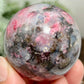 Rhodonite in Quartz Sphere Peru Healing Crystal Ball 202g 50mm