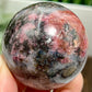 Rhodonite in Quartz Sphere Peru Healing Crystal Ball 202g 50mm